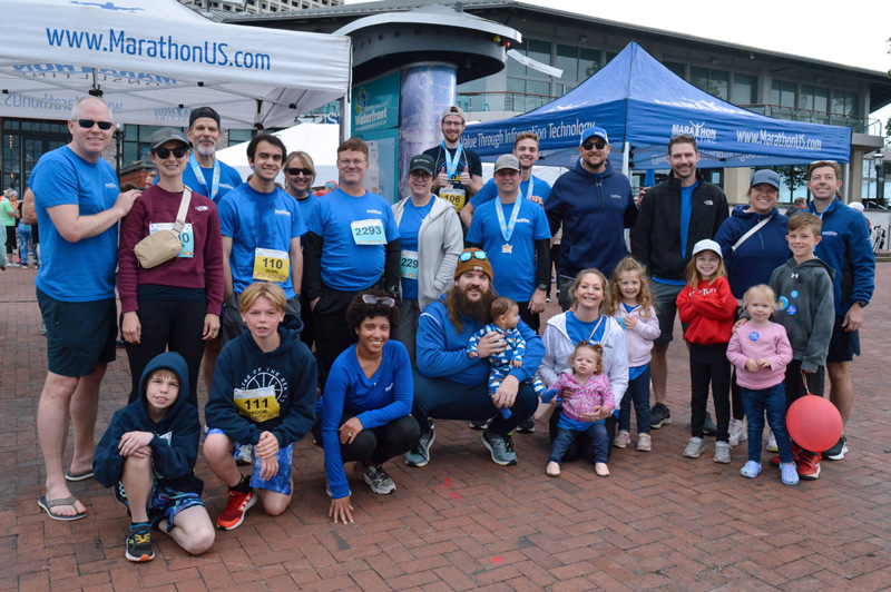 Marathon Consulting team and family group at the 2024 CHKD RunWalk